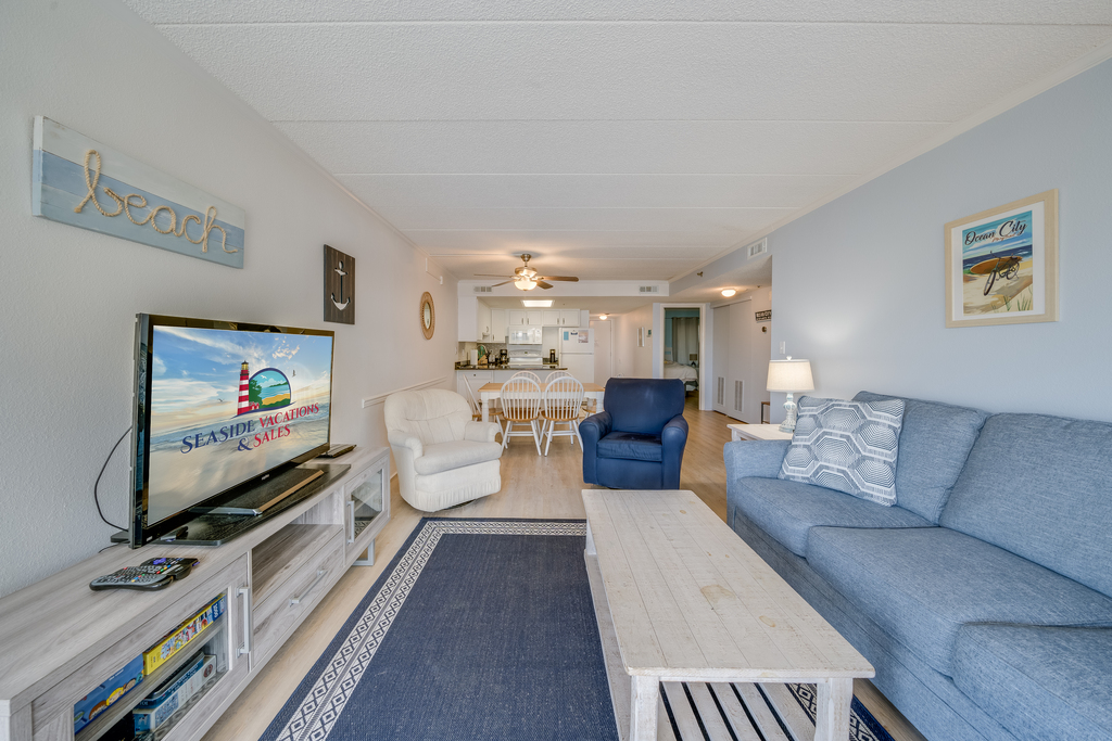 There is plenty of space in this open living room for the whole family to gather around for some board game action!