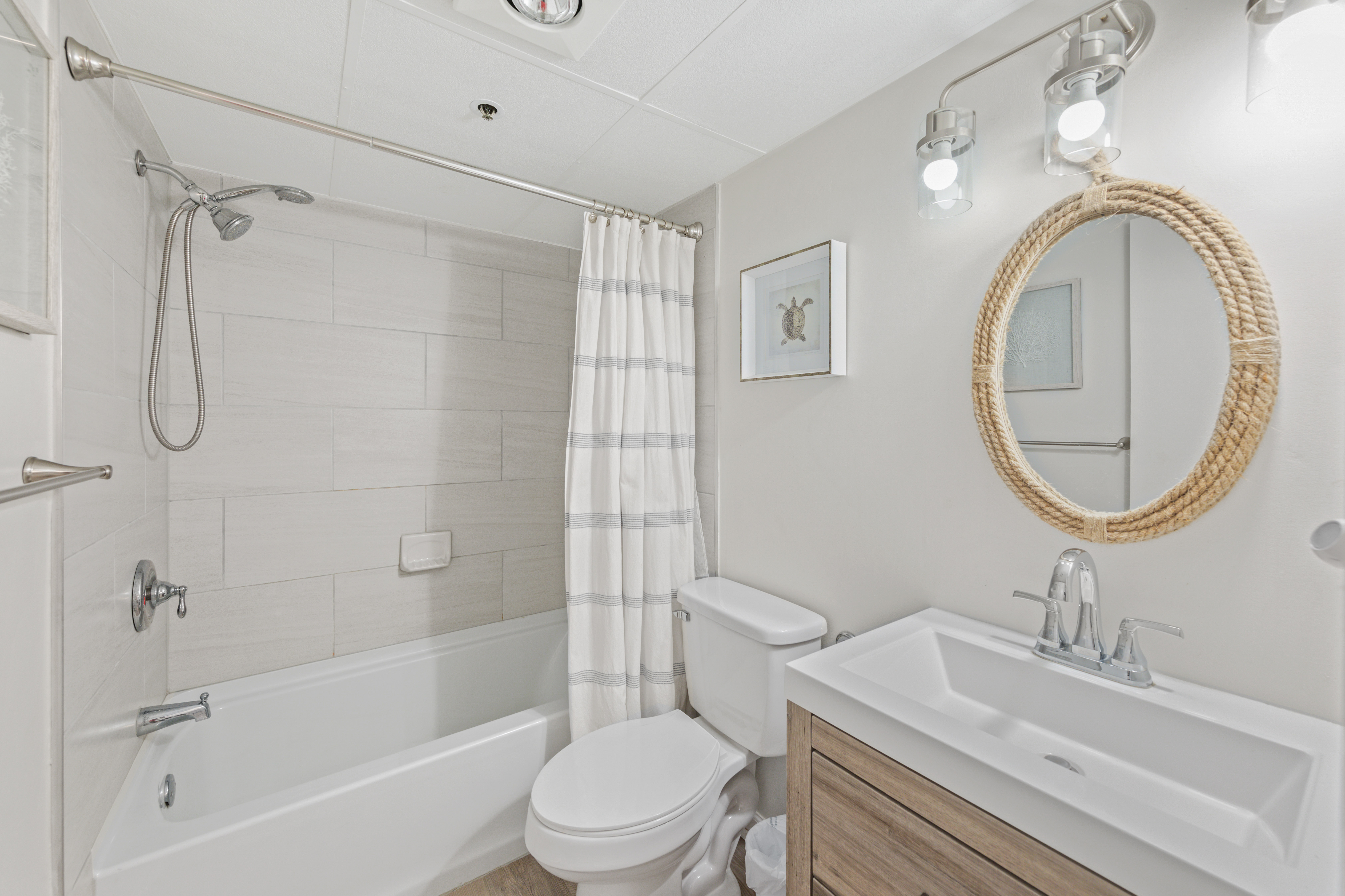 The Updated Full Shared Bath features a Shower/Tub Combo.