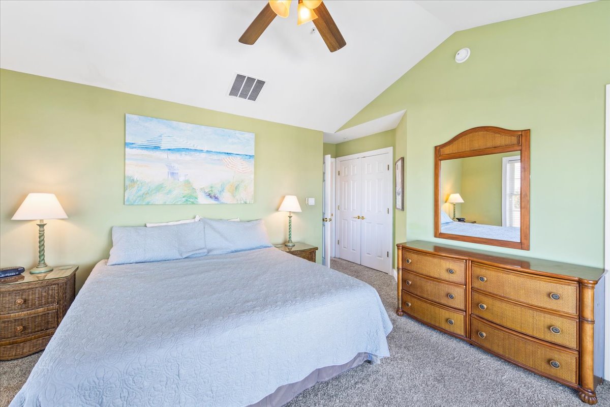 The Beautiful Primary Bedroom with a Plush King Bed