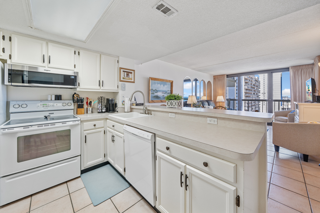 The Chef in your Family will never miss out on the Fun while Preparing Meals in this Open Kitchen!