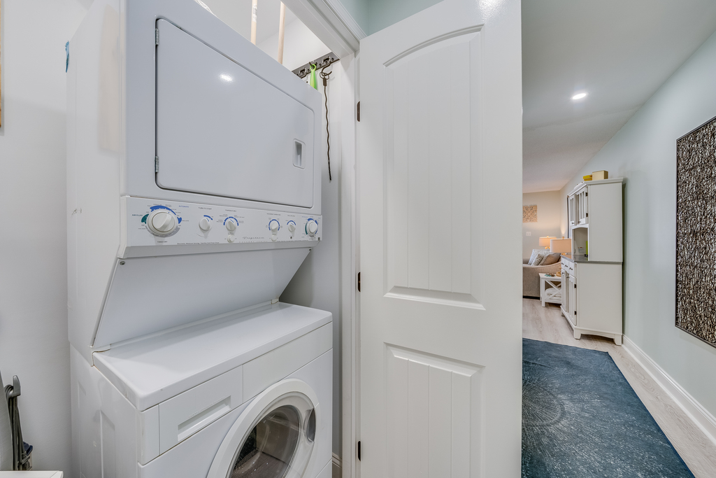 Stacked Washer/Dryer in the hallway for your use.