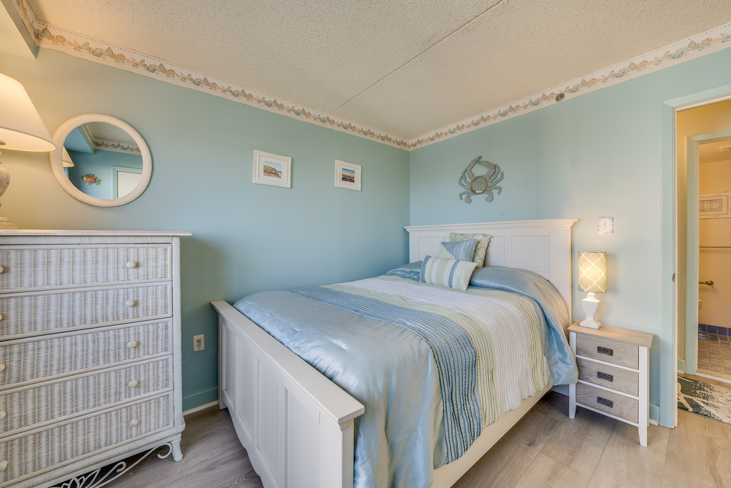 Bedroom 2 features a Queen Size Bed.