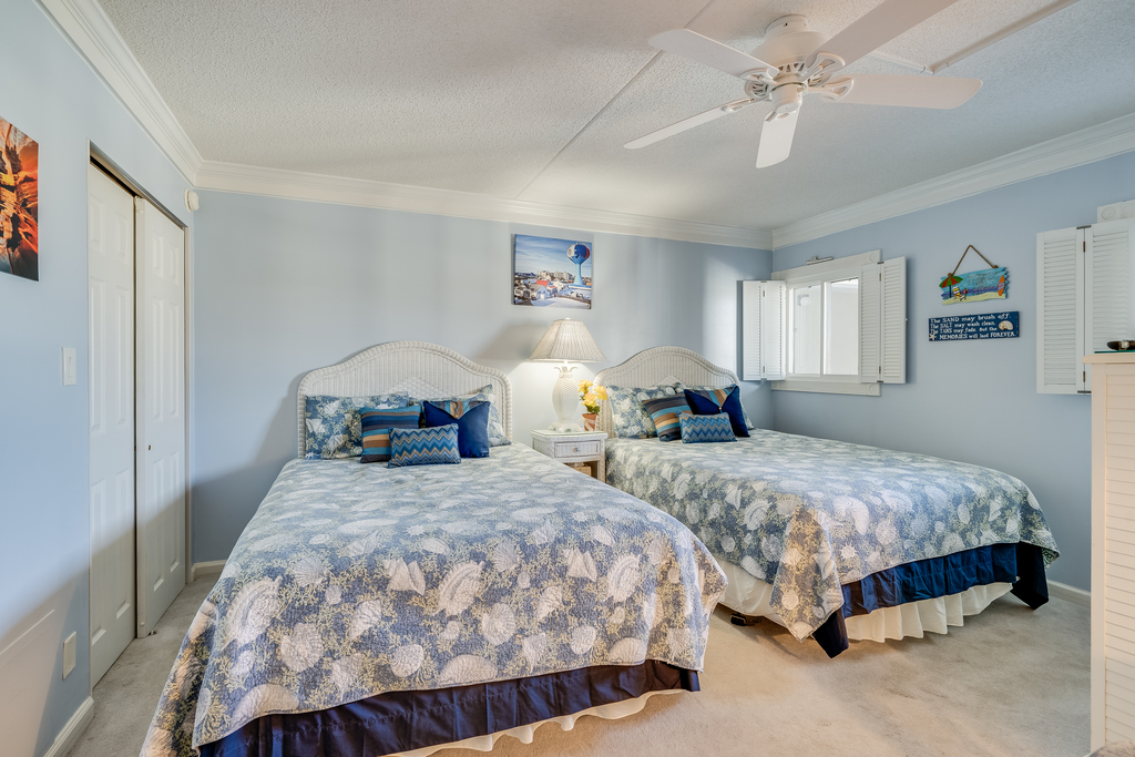 The Bedroom features 2 cozy Queen Beds!