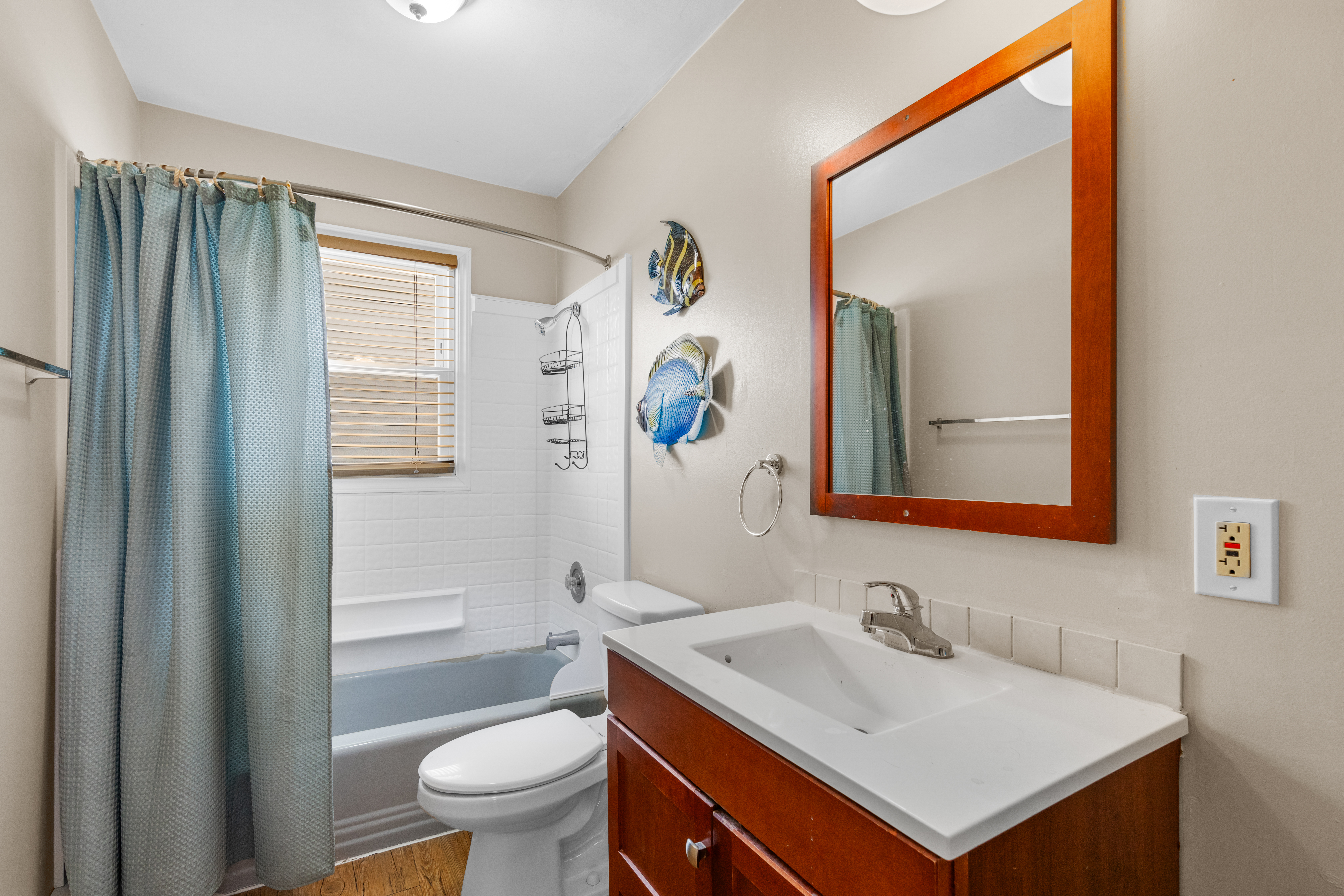 Convenient to all 3 bedrooms is the Shared Bath.