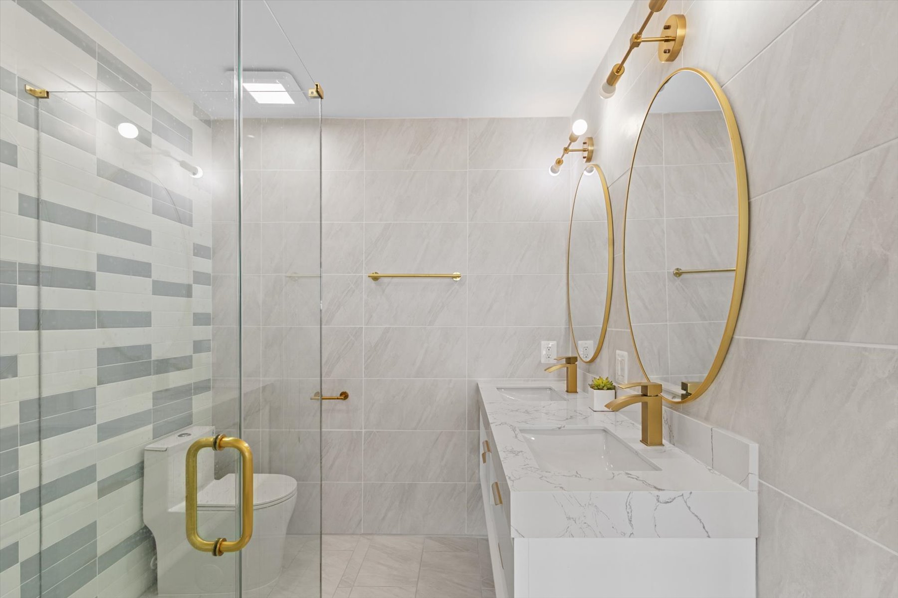 Primary Bath featuring a double vanity, walk-in shower.