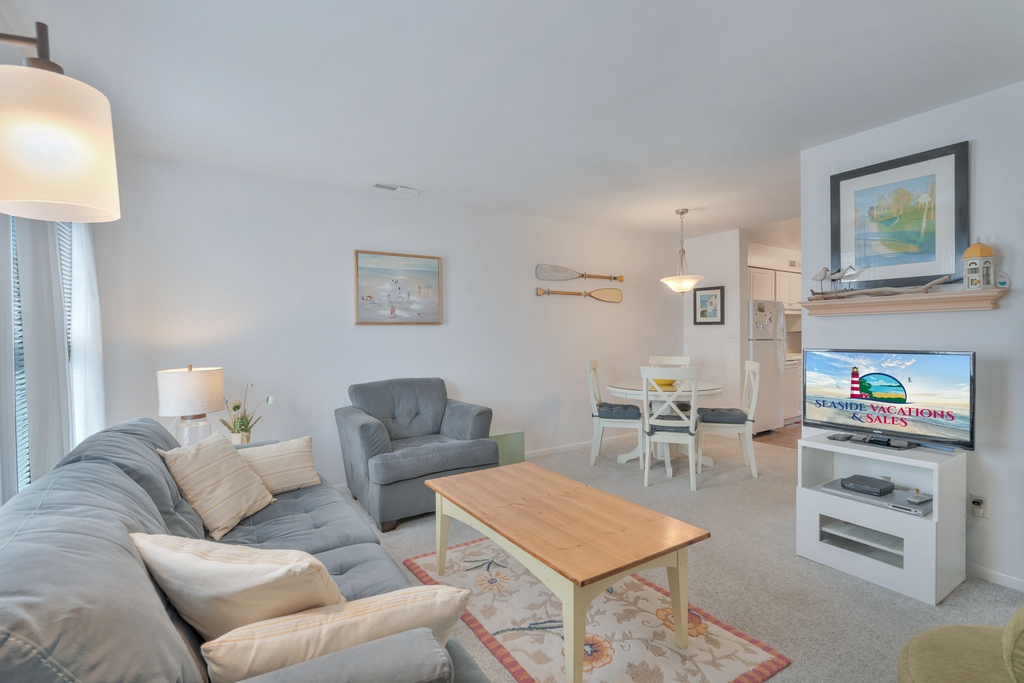 Relax in the Living Area with Free WiFi and Flat Screen Smart TV after a fun day spent exploring Assateague - less than 10 min away!