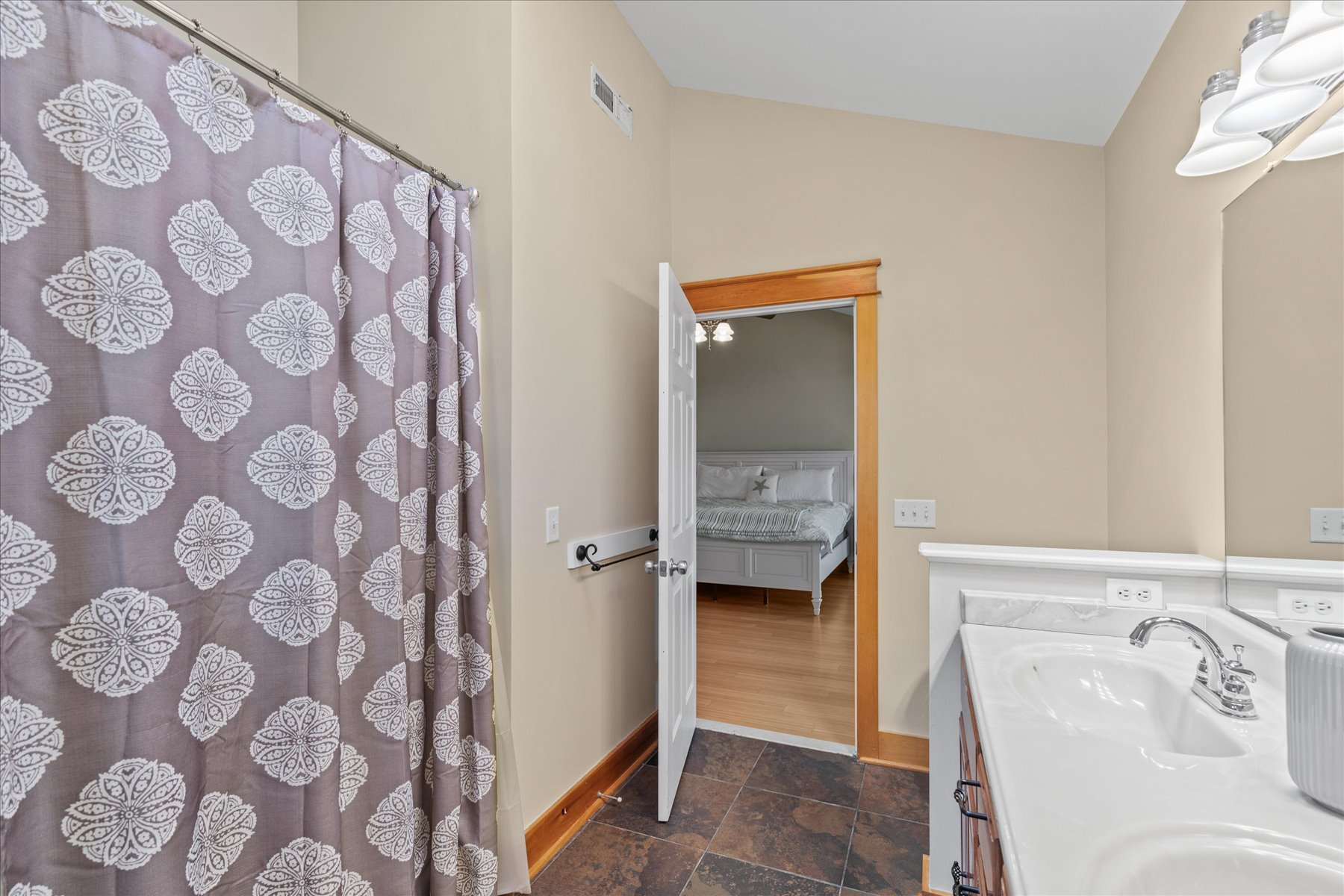 Primary Bedroom has a Walk-in Shower.