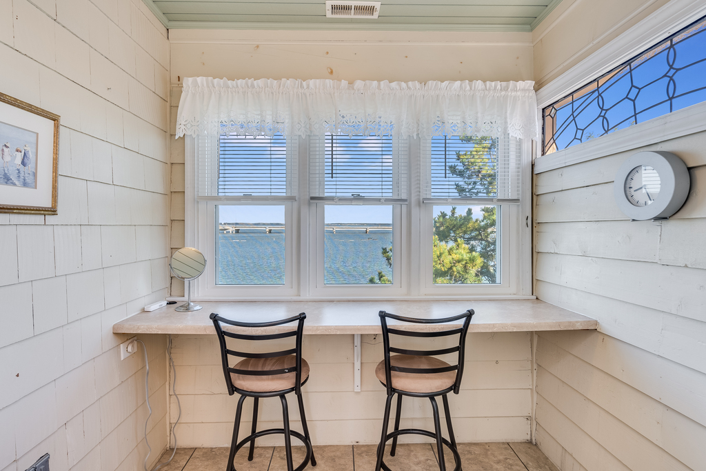A special place to take in Bay Views from the Master Bedroom.