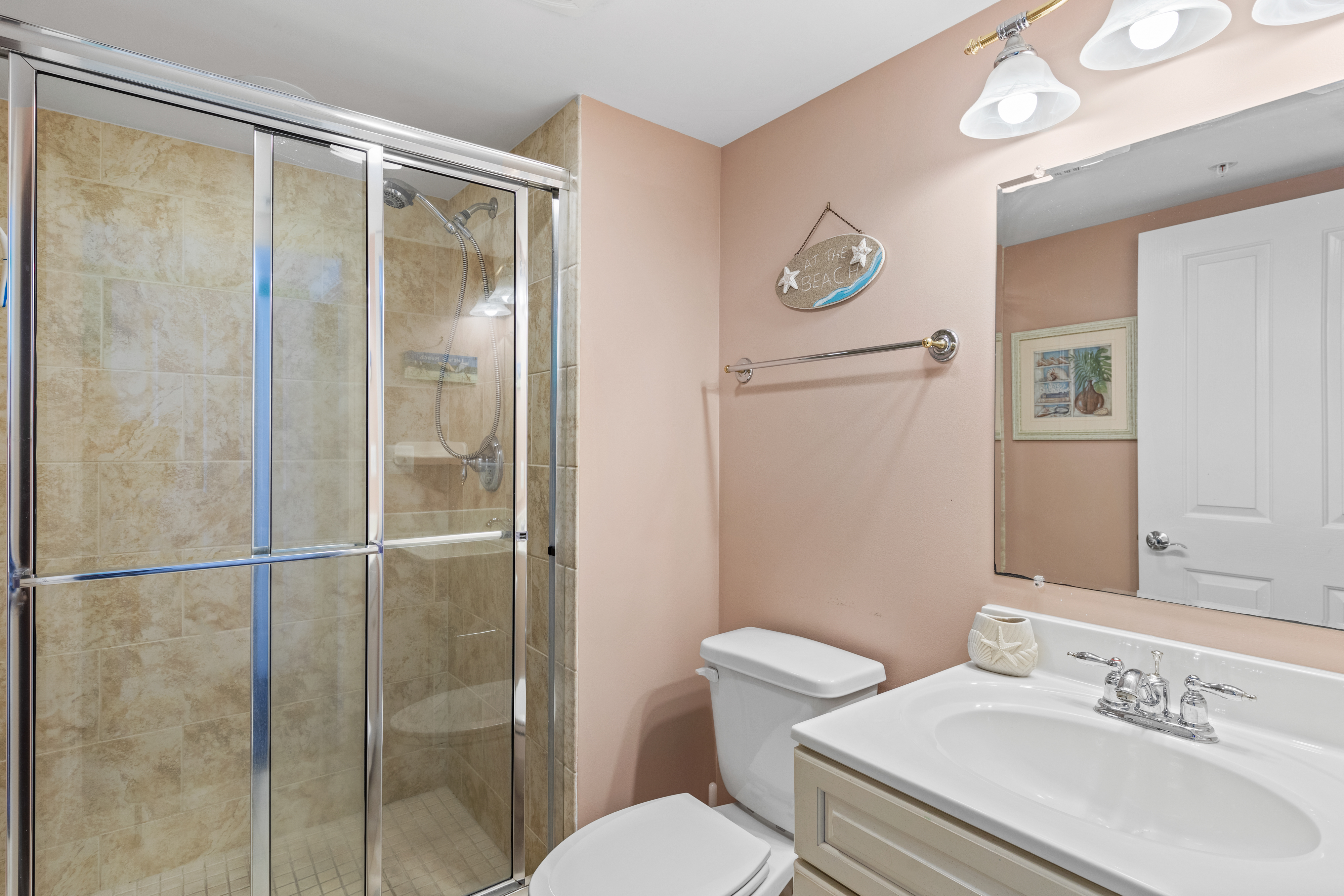 The Attached Full Bath features a Walk-In Shower.