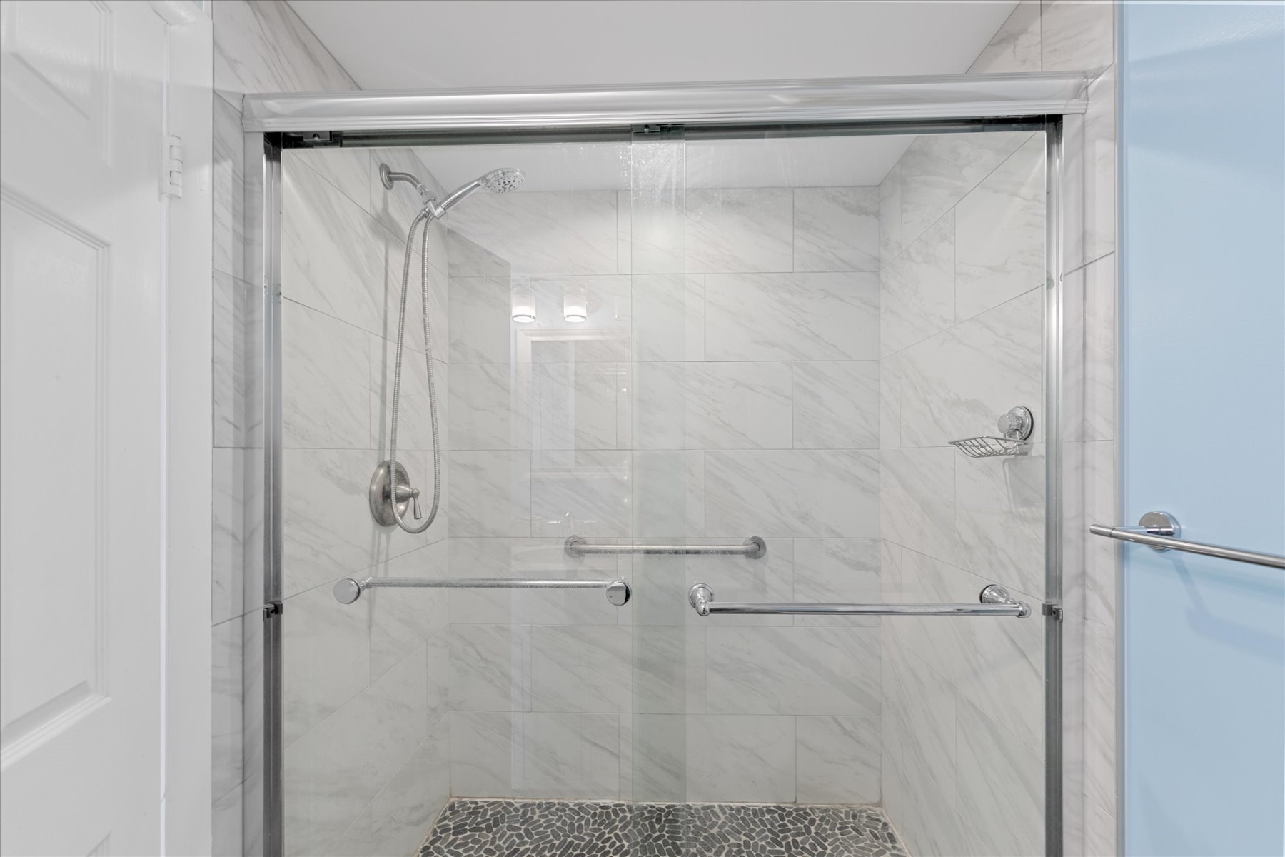 Features a Marble Walk-in Shower.
