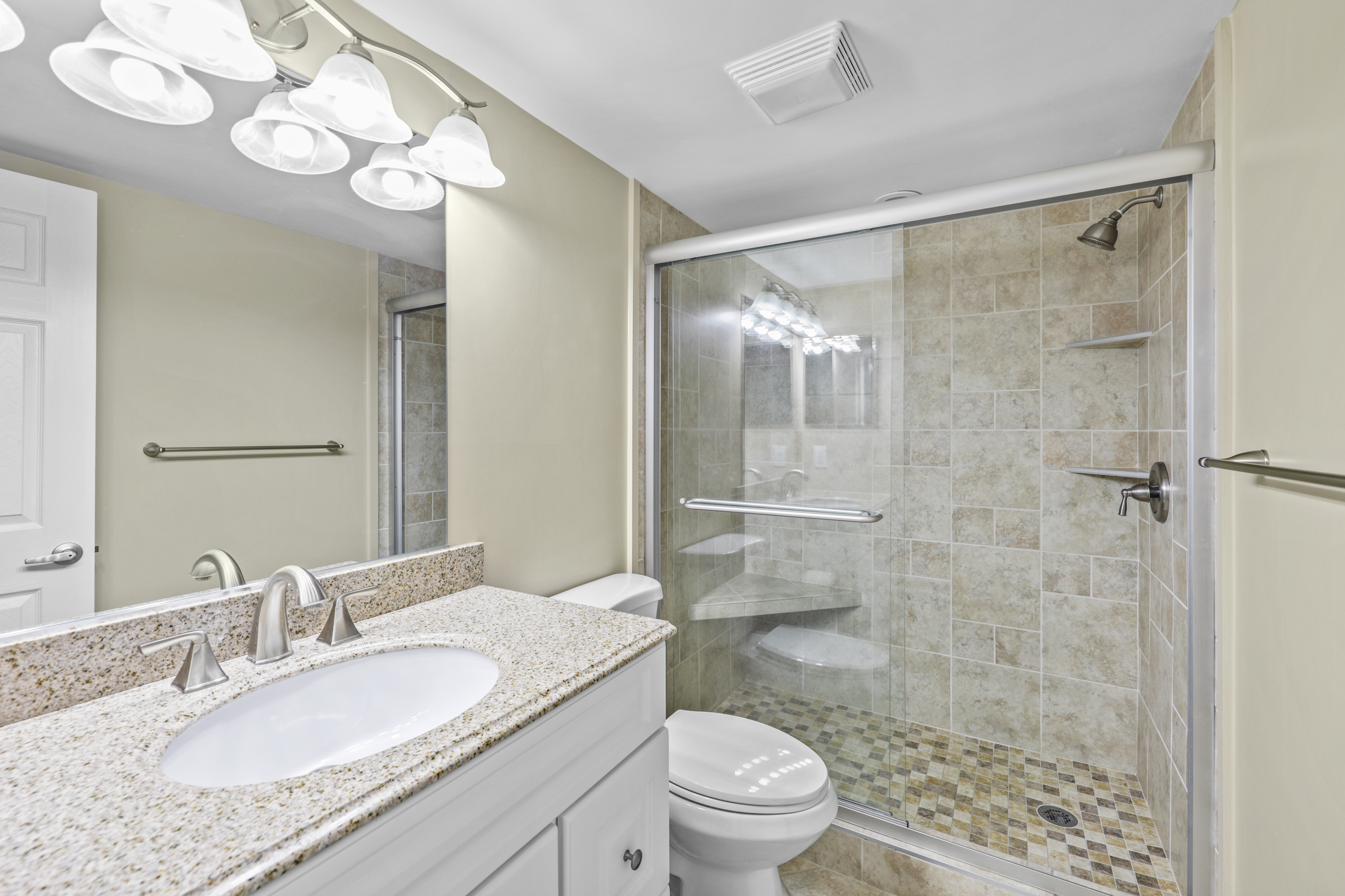 Gorgeous full shared bath with a walk-in shower.
