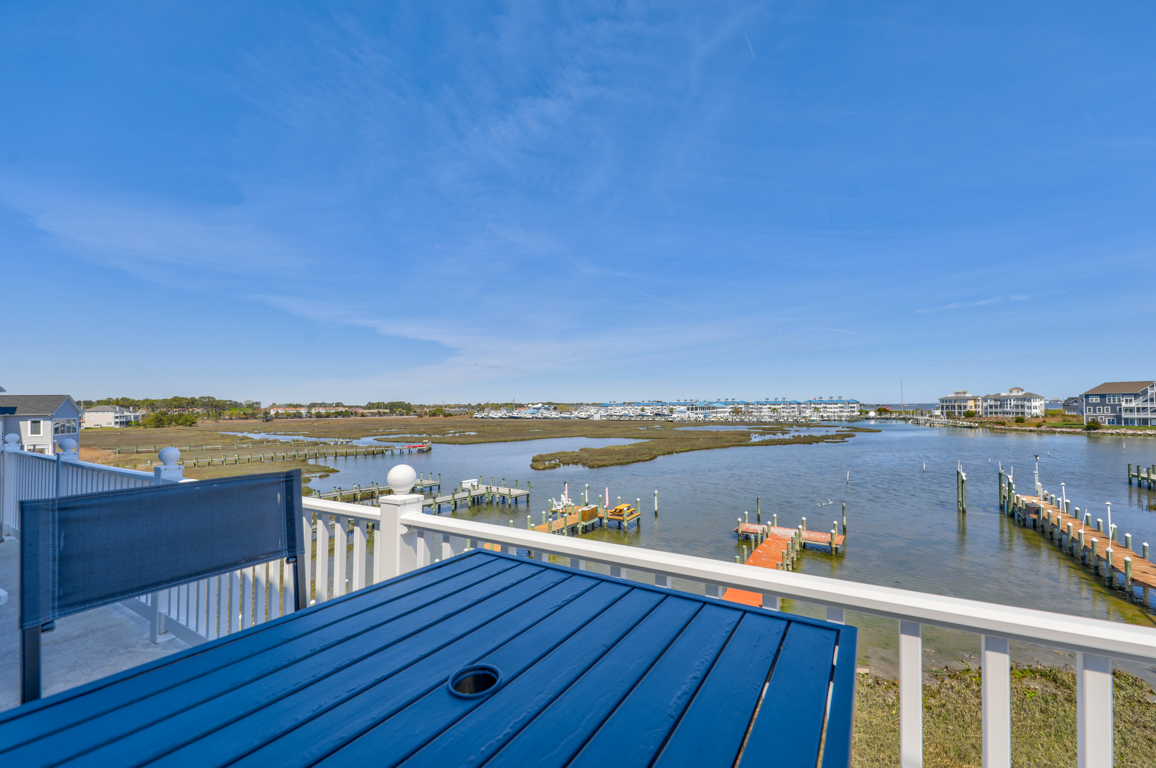 Gather around the outdoor Balcony Dining Area.