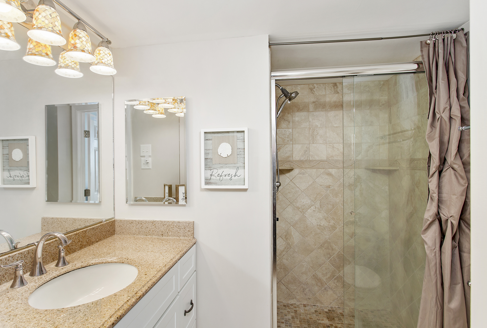 Stunning Custom Tile in Primary Bath.
