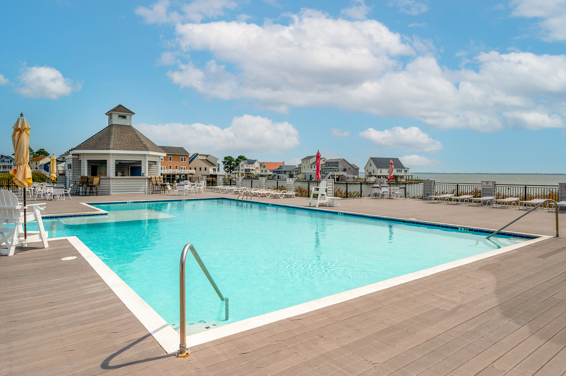 Take a dip in the refreshing Bayfront Pool with Tiki Bar (Amenity Fees Apply).