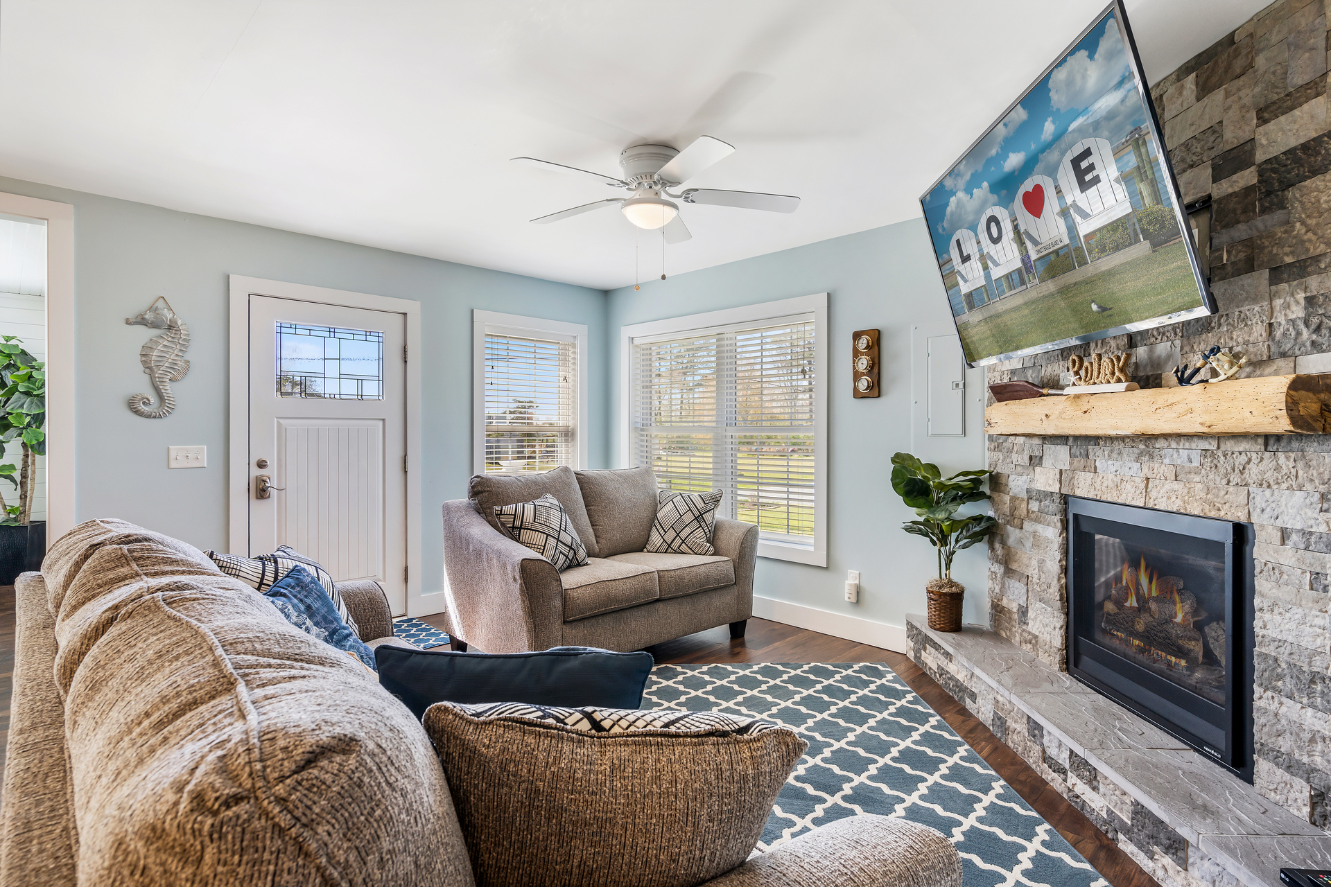 Gorgeous Stone Fireplace, Free WiFi, & Huge Flat Screen Cable TV in Living Area.