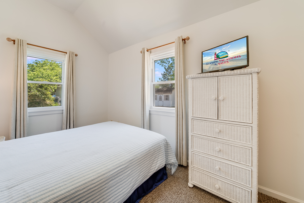 A 2nd Flat Screen TV is in the Bedroom.