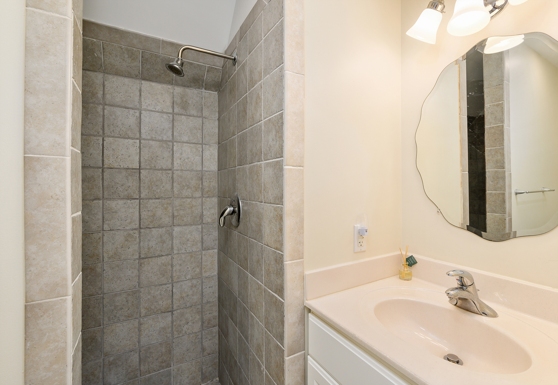 Junior Master Bath with Custom Walk-in Shower.
