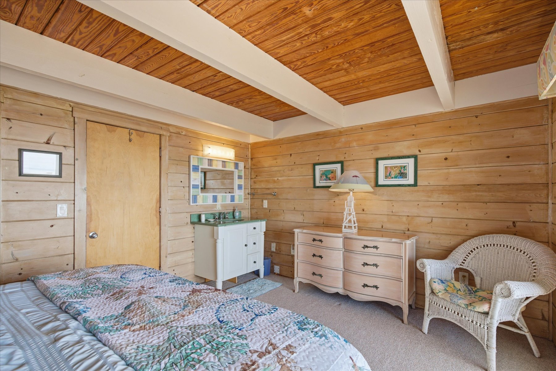 Bedroom 3 has a plush King Bed, sink and vanity in the room and incredible Ocean Views.
