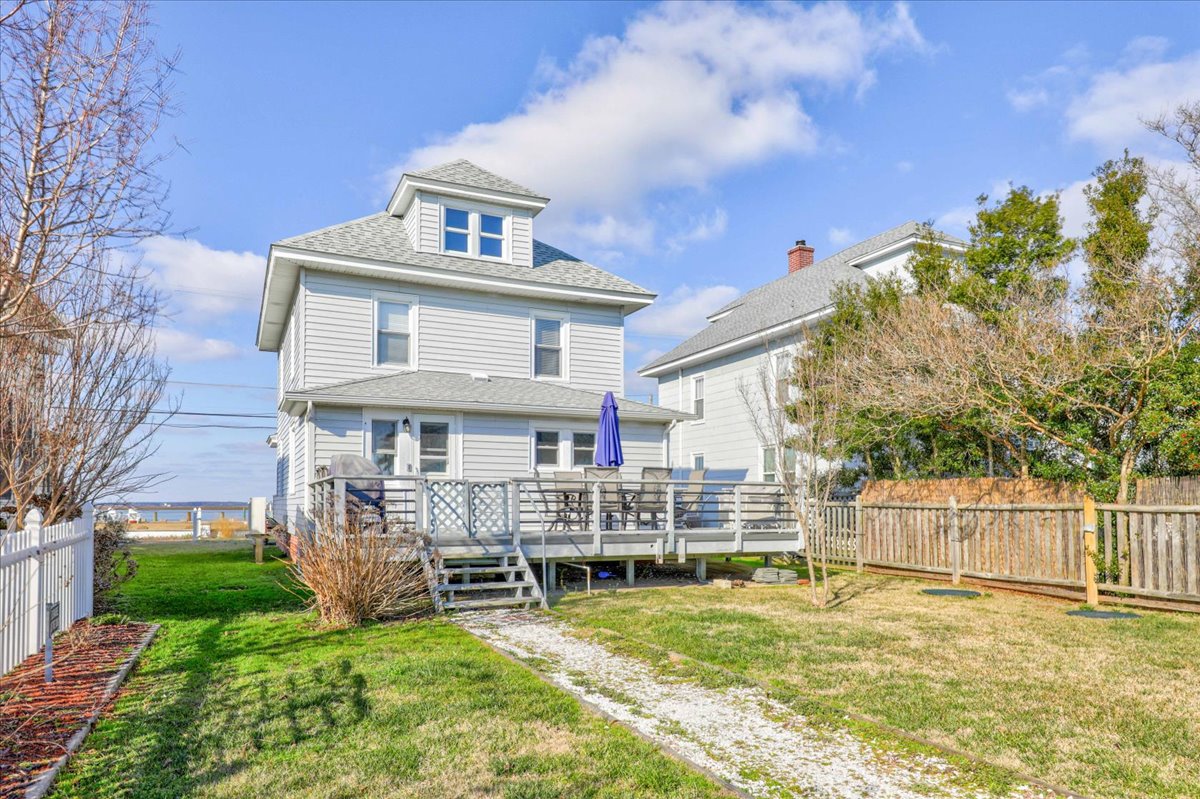 Large Deck lines the back of the house - a great place to hang out and enjoy dinner.
