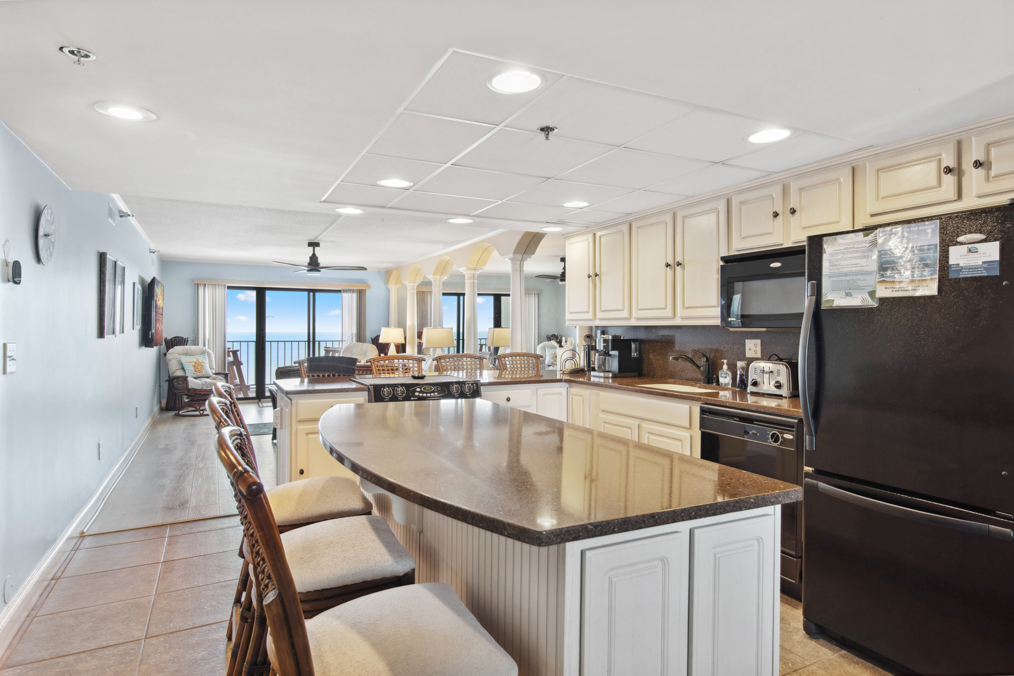 Pull up a seat at the Island and keep the chef in your family company.