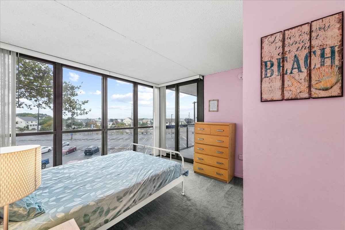 You'll love the natural lighting that beams through these Floor to Ceiling Windows!