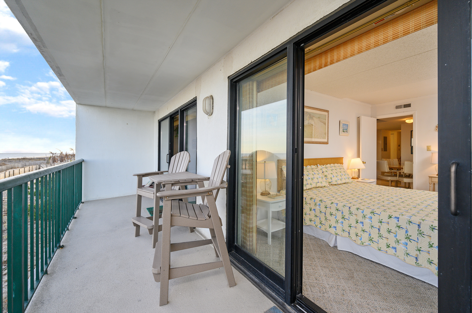 Slip outside watch the waves crashing on the beach from your private balcony