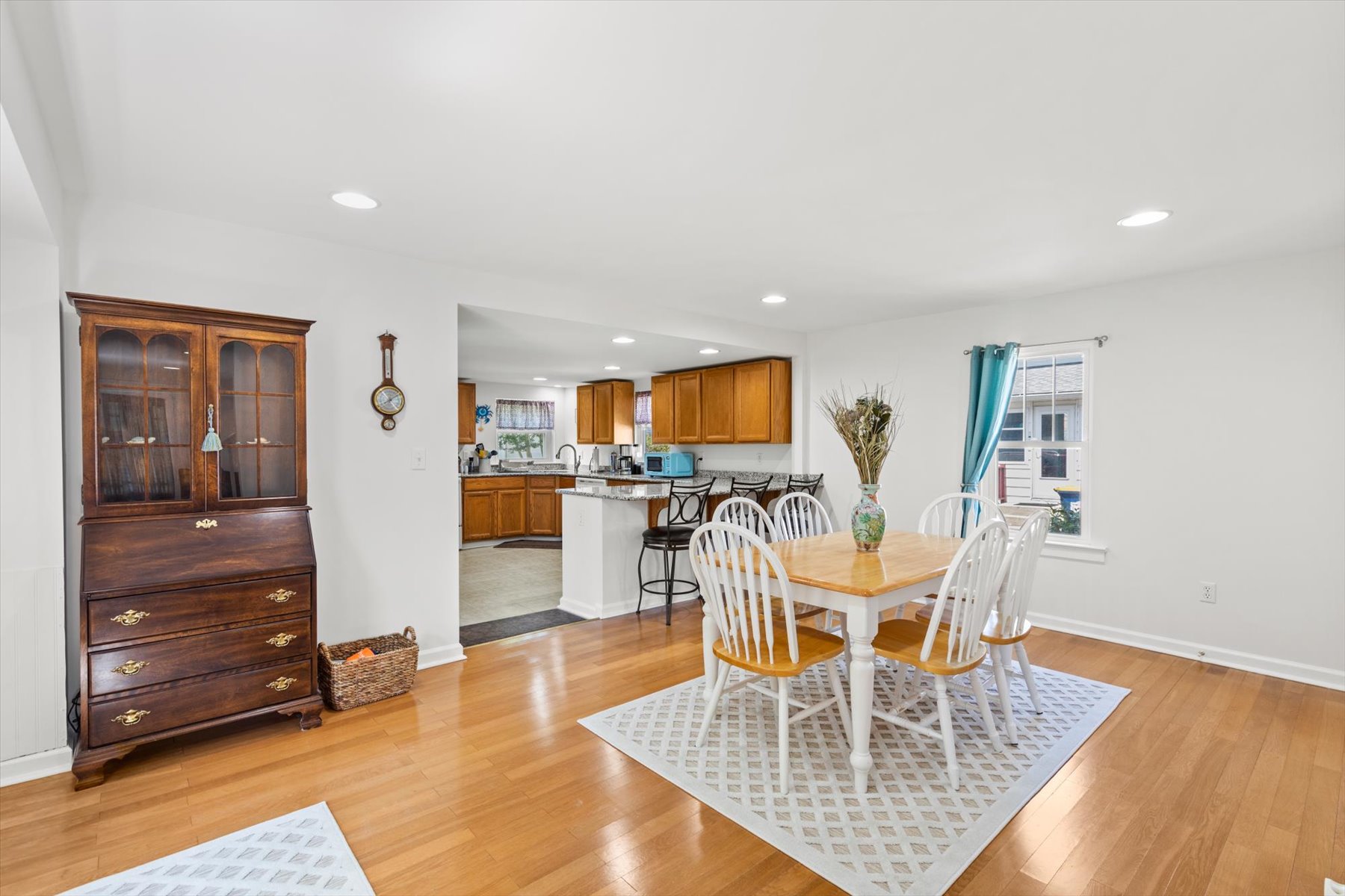Spacious Dining Area - we love these gorgeous Hardwood Floors!