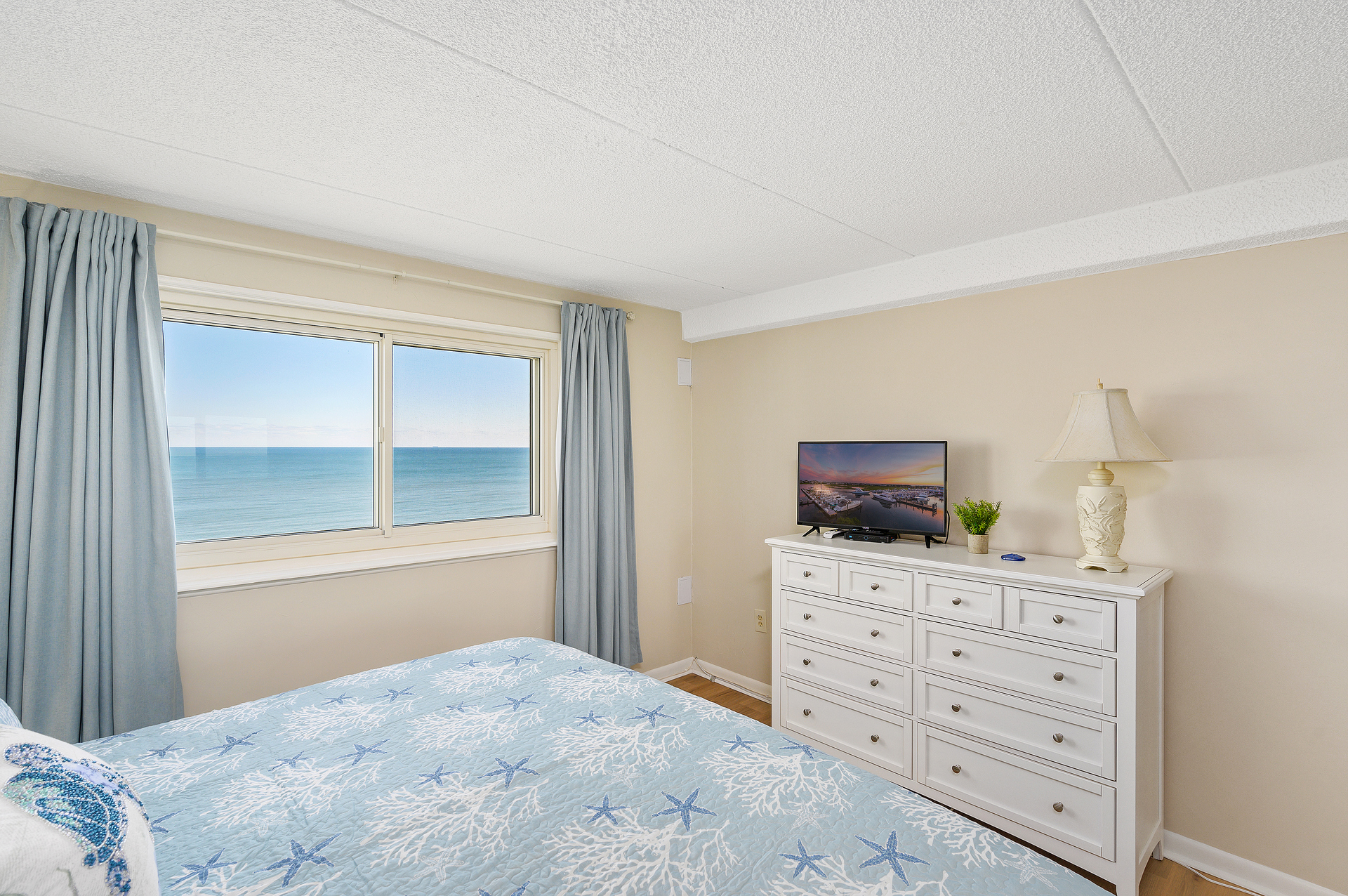 Relax and watch a movie on the Flat Screen TV right from Bed in the Primary