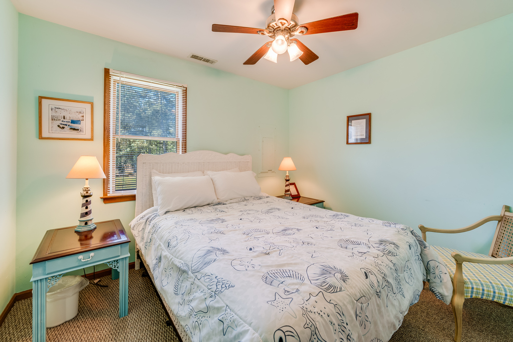 Downstairs, Bedroom 1 has a comfy Queen Bed.