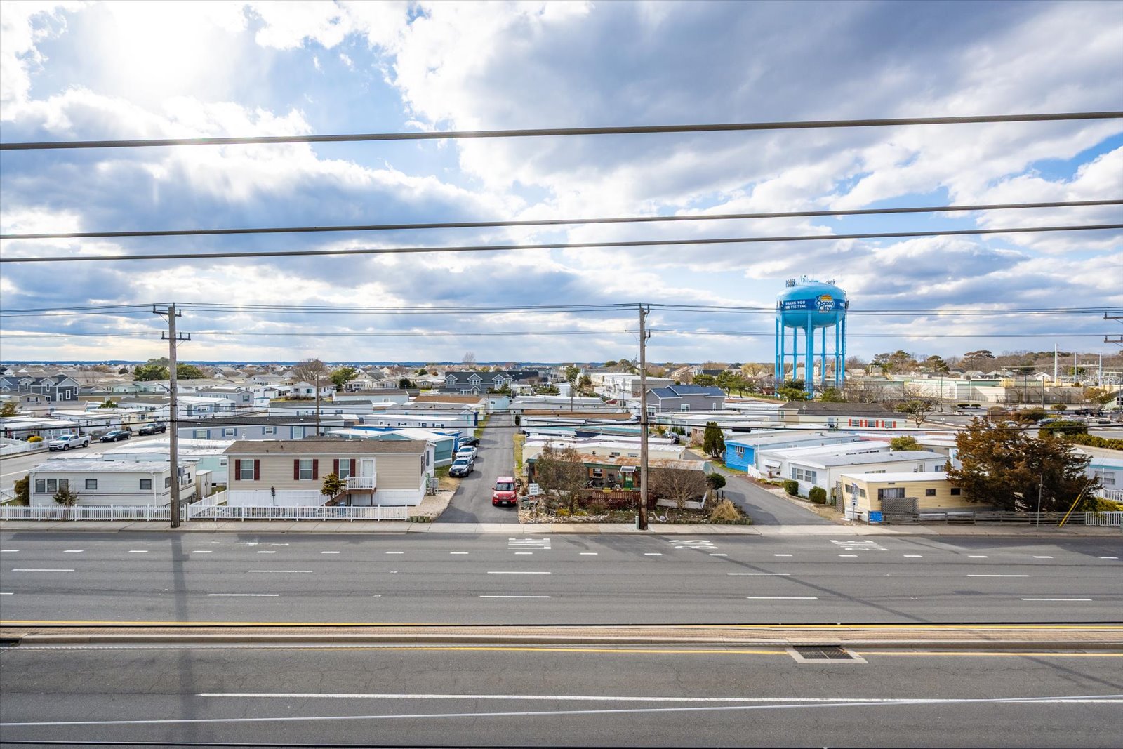 Enjoy open, sunny skies and a classic coastal town view stretching out across the horizon.