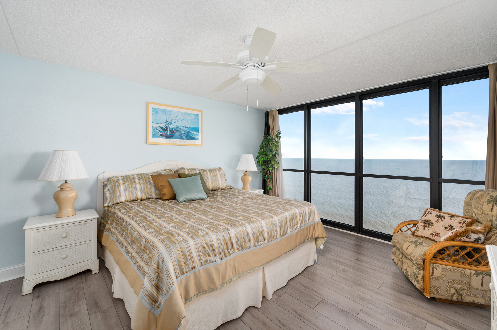 The Primary Bedroom has a King Bed and Private Balcony Access.