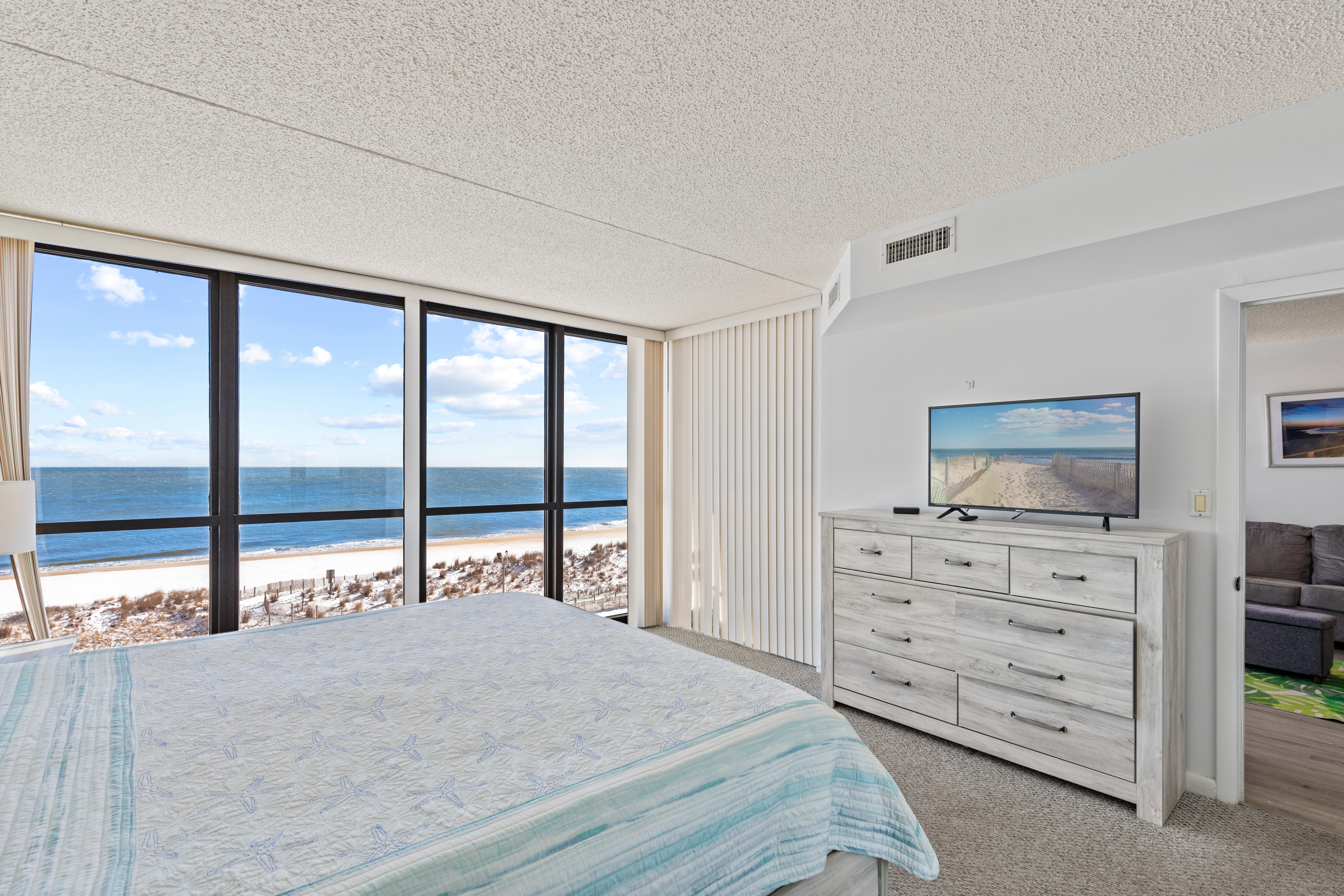 Sink into the Cozy King Bed and enjoy the Flat Screen TV.