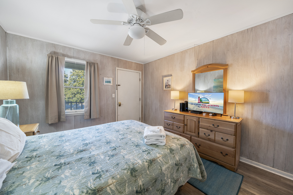 The bedroom also has a Flat Screen TV