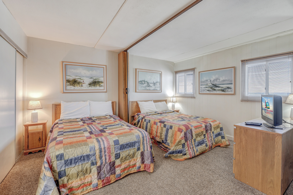 The Bedroom has 2 cozy Double Beds!