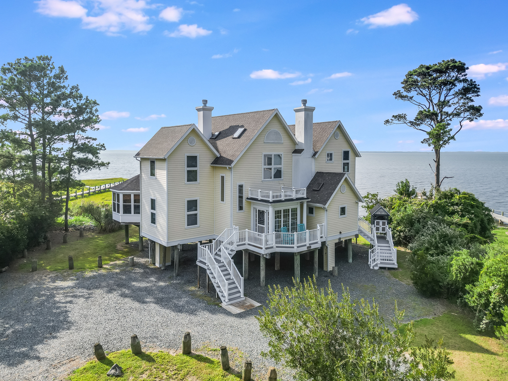 Sunkissed Shores sleeps up to 12 in 4 Bedrooms and with 4 Full Baths.