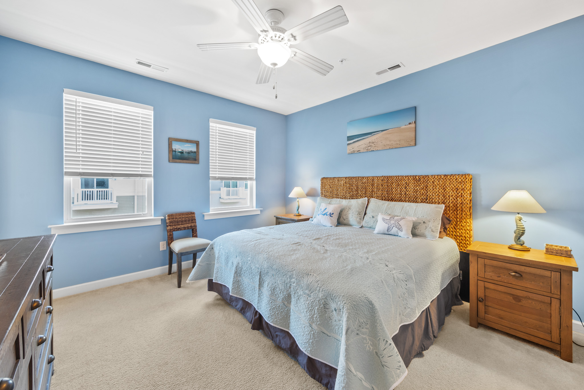The Primary Bedroom is adorned in hues of blue.