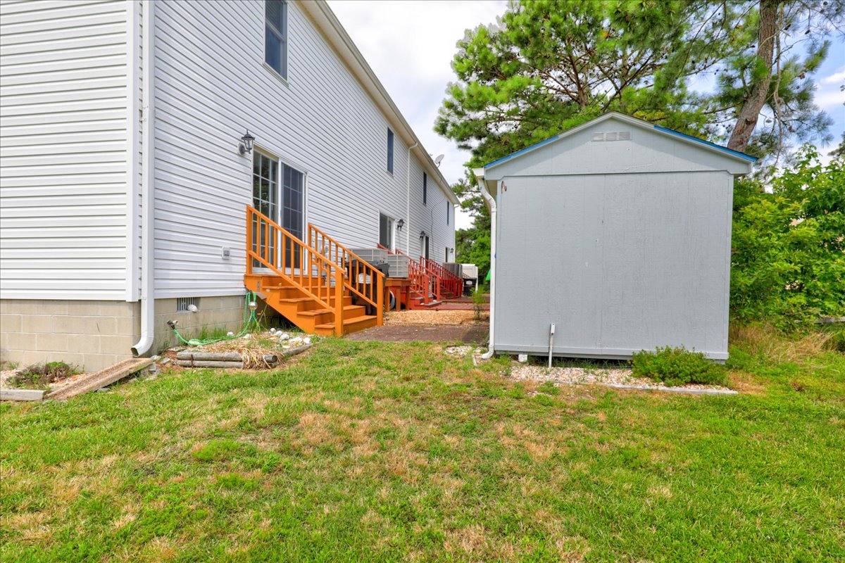 Small Backyard where you can grill some burgers.