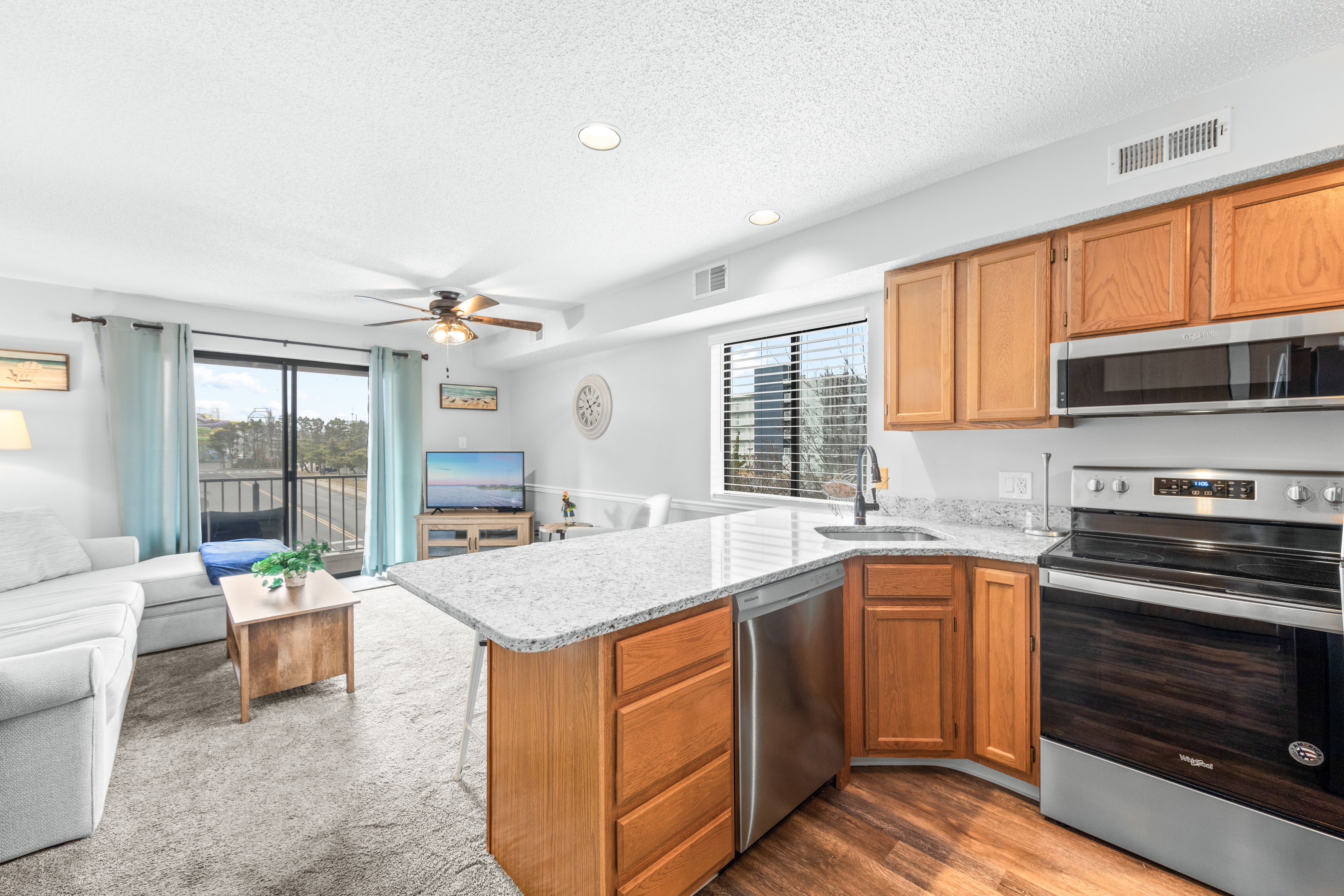 Spectaular Kitchen with Stainless Appliances and gleaming Countertops.