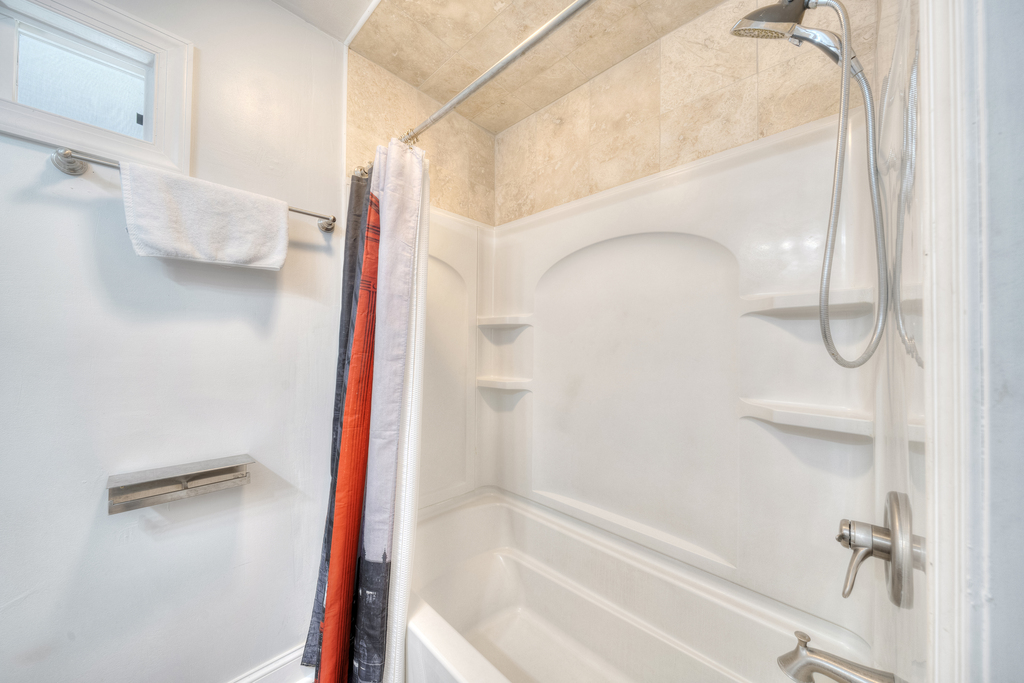 Attached Full Bath has Tub/Shower Combo.