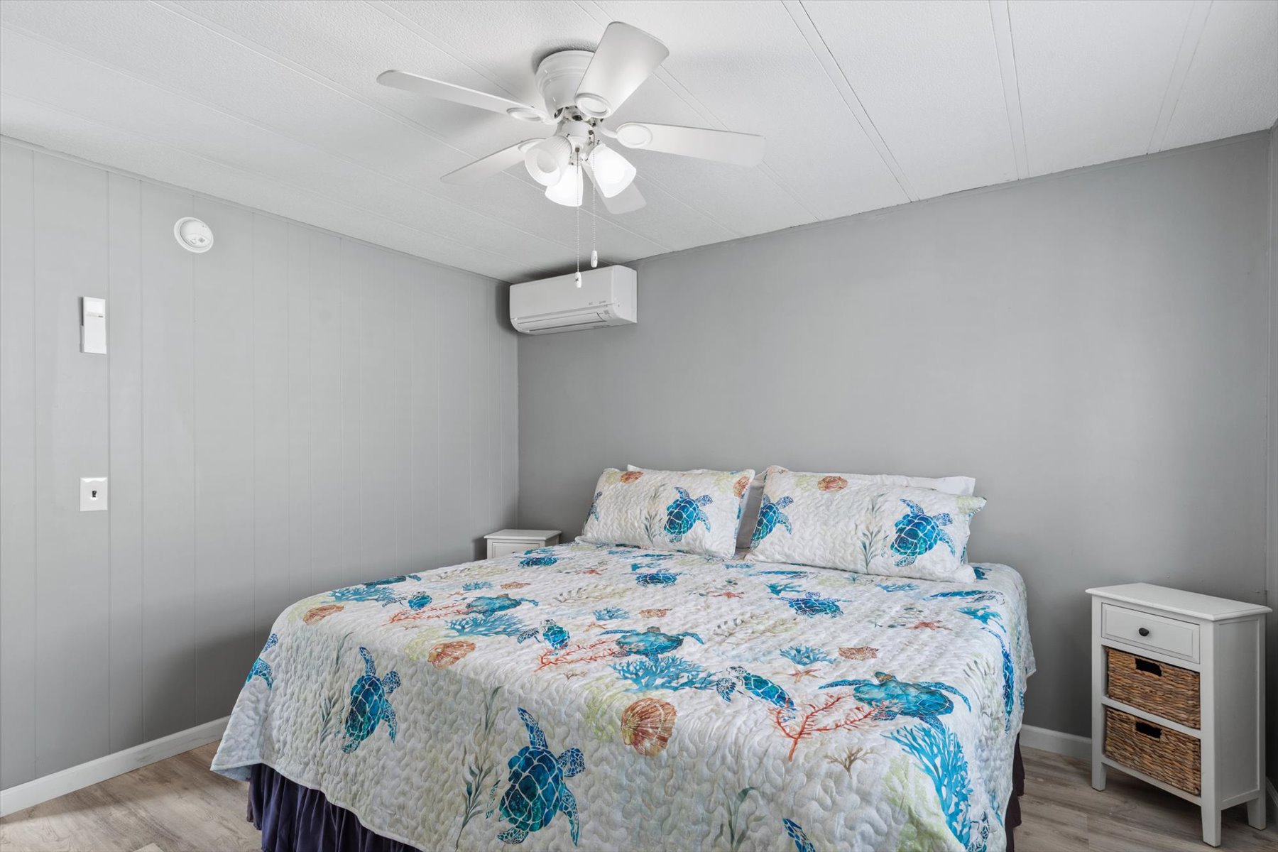 Located just outside this bedroom is a shared Bath.