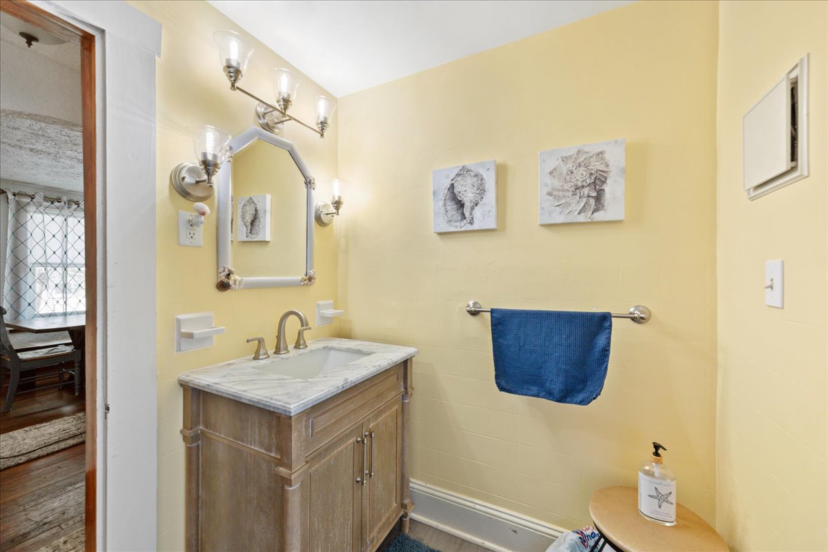 Full Bath 1 is convenient to Bedrooms 1 and 2 and the Living Area.