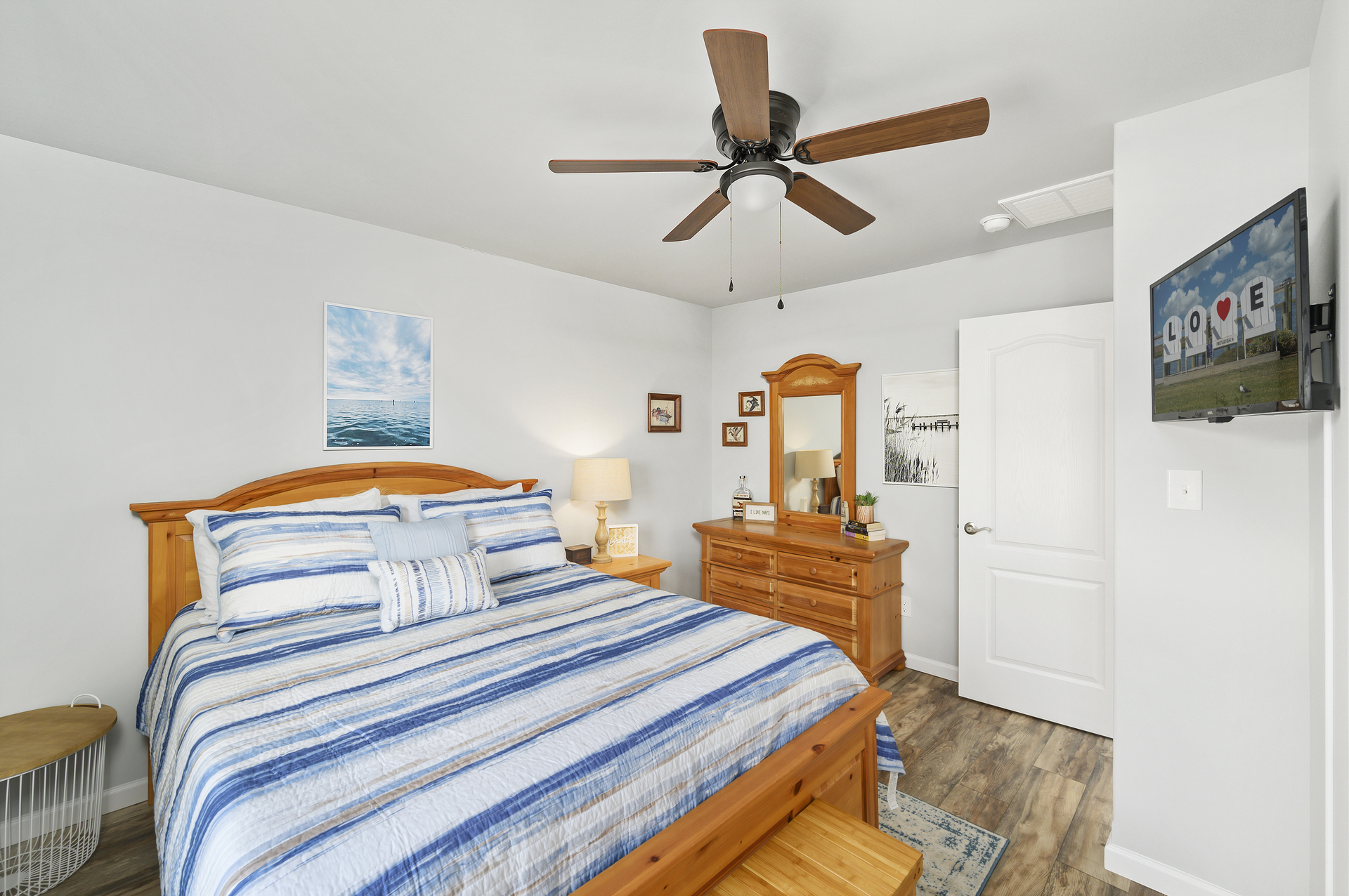 Bedroom 3 has another Queen Bed and beachy blues.