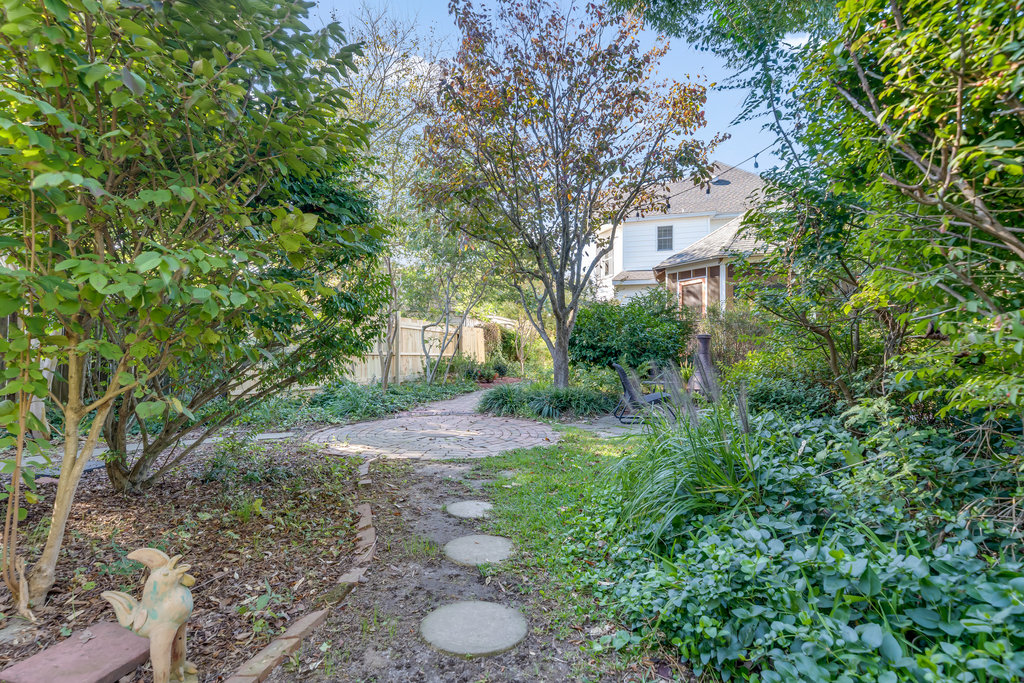 Oasis on Main is known for its lush Gardens and Trails throughout the yard.