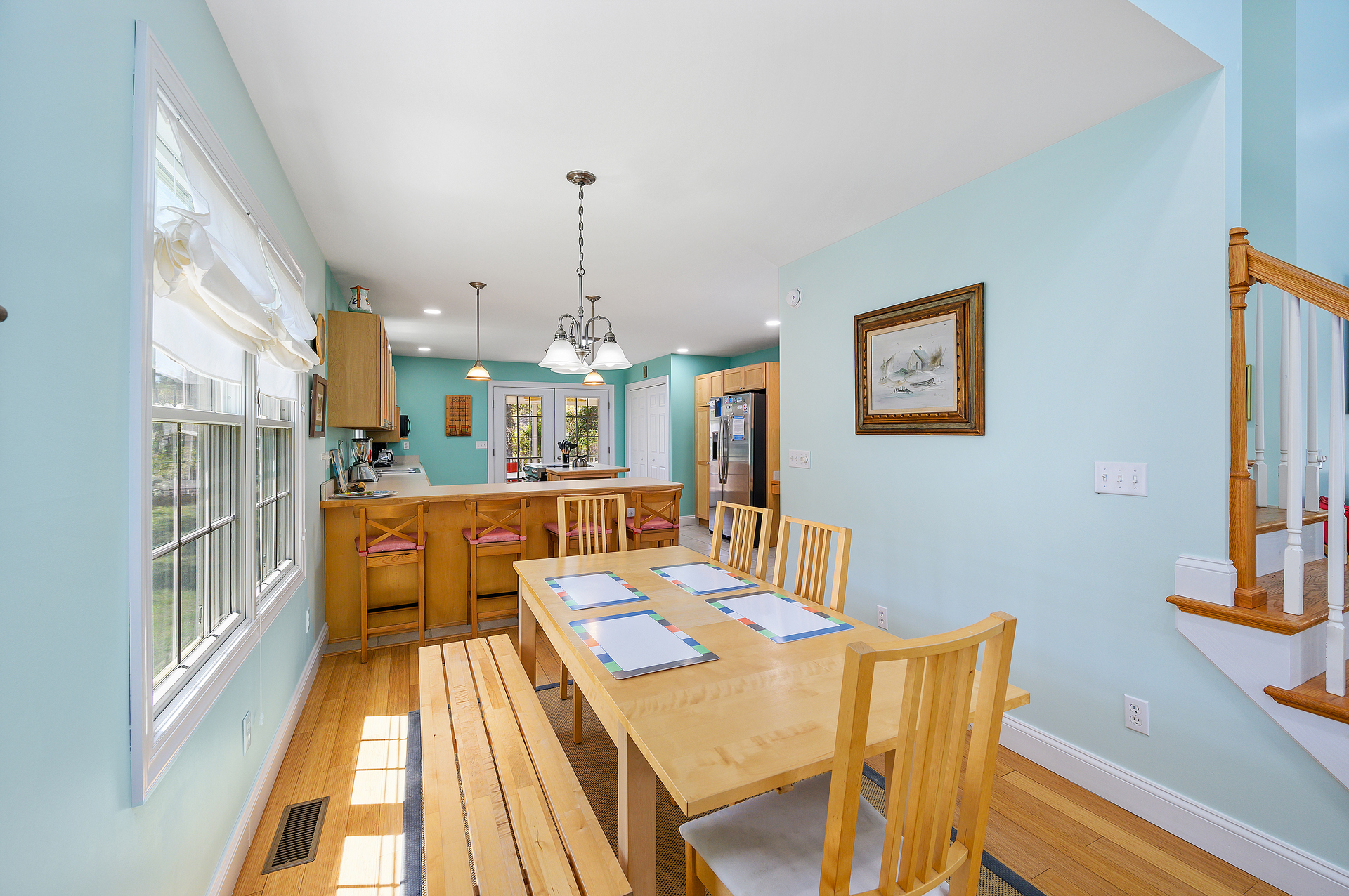Billowy, Beachy white shades add to the Coastal Feel of this awesome Home.