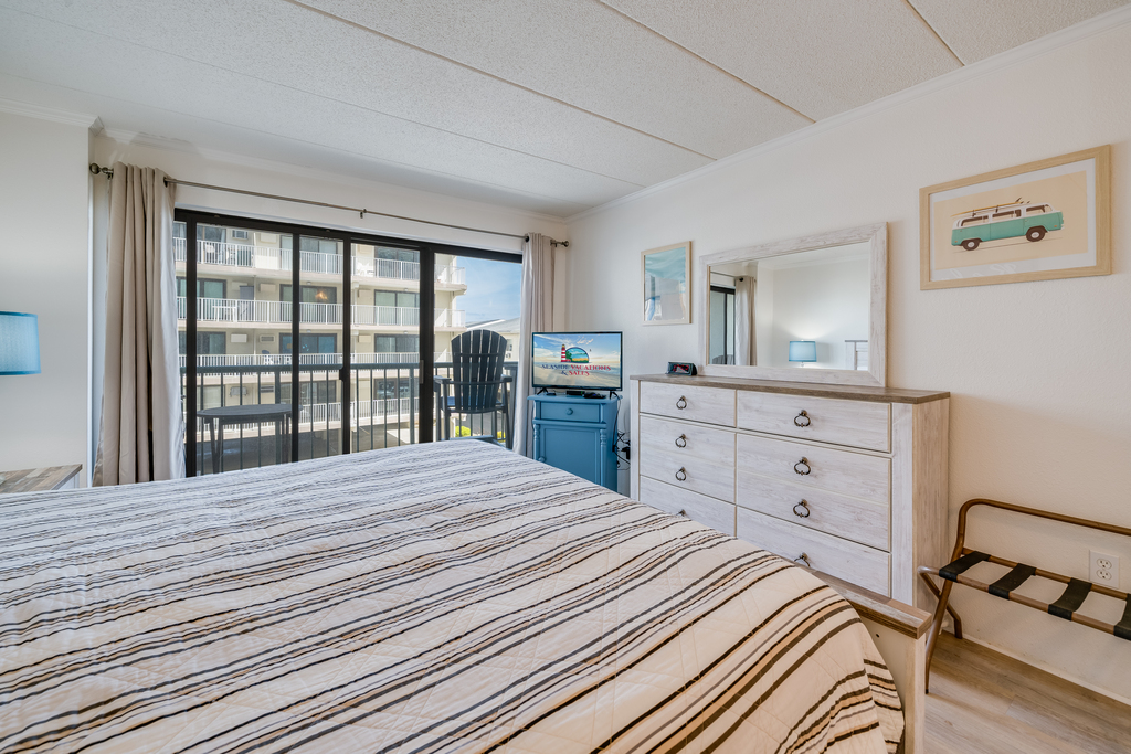 Primary bedroom has private access to the balcony.