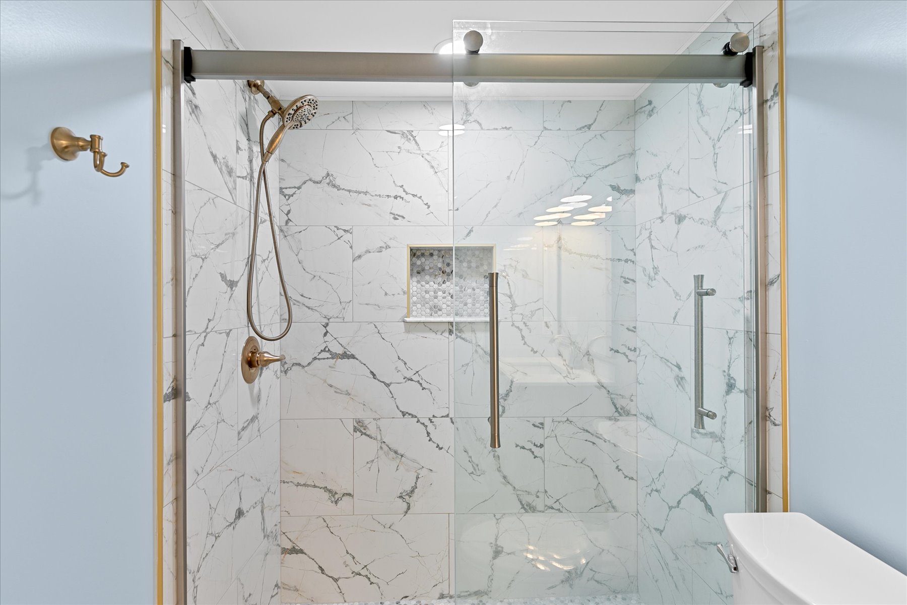 Features a spacious Walk-In Shower.