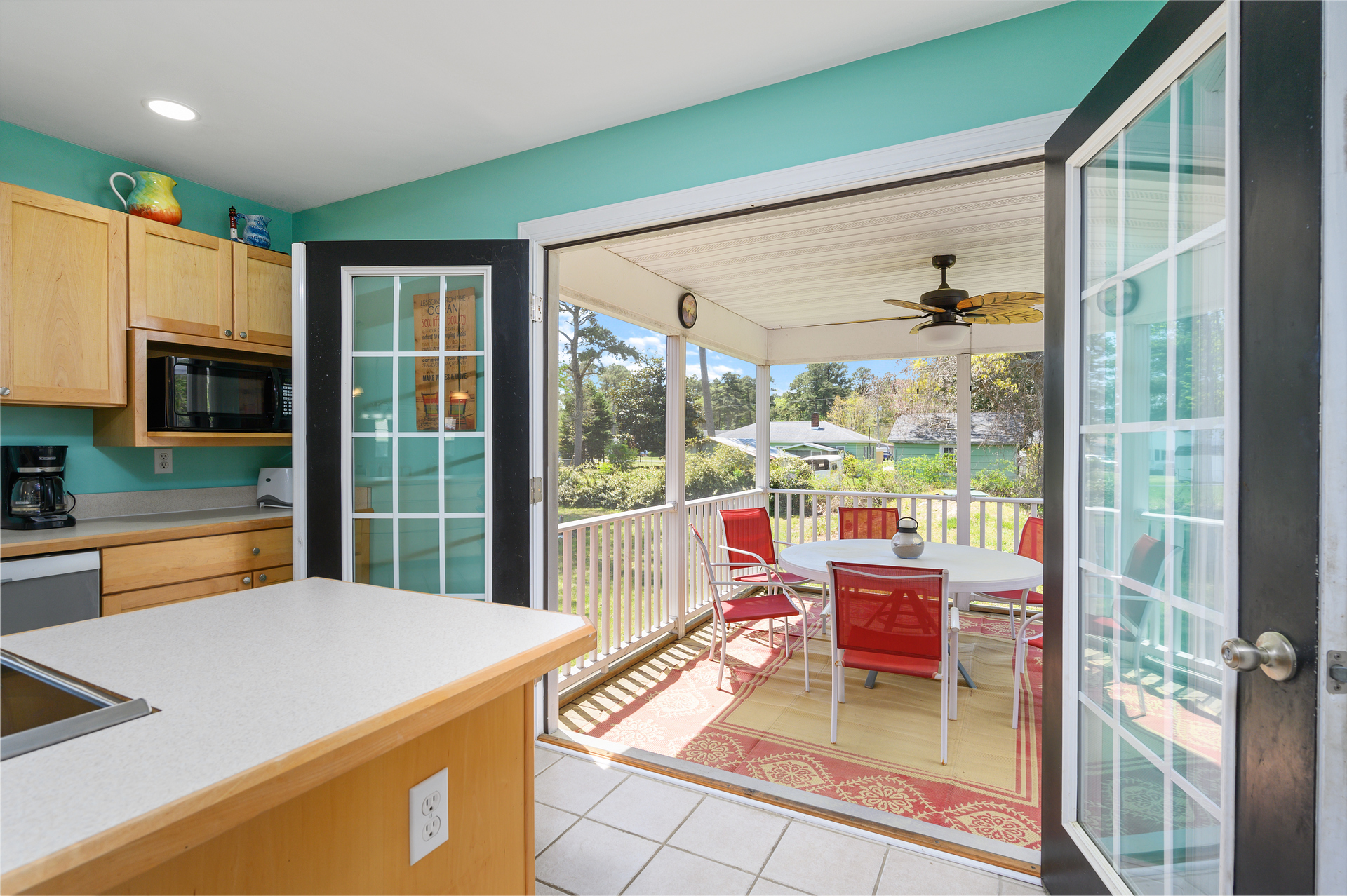 French Doors lead to the fabulous Screened Porch.