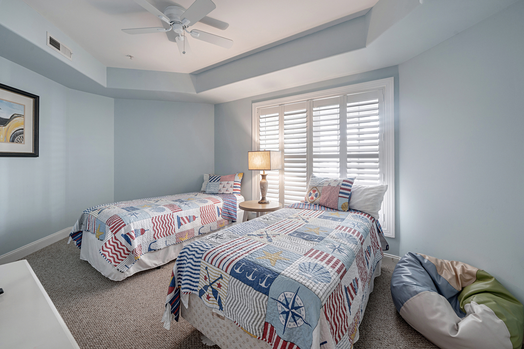 Bedroom 3 is decked out in a fun nautical decor, and has 2 Twin Beds.