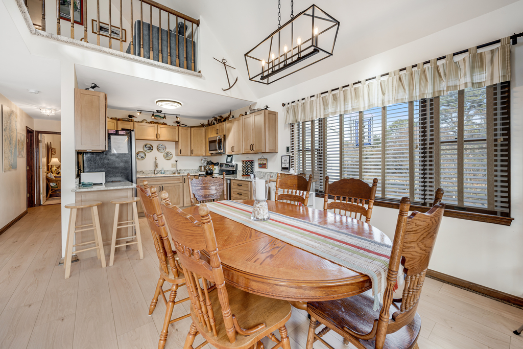 Soaring ceilings and a wall of window to the waters is just dreamy.