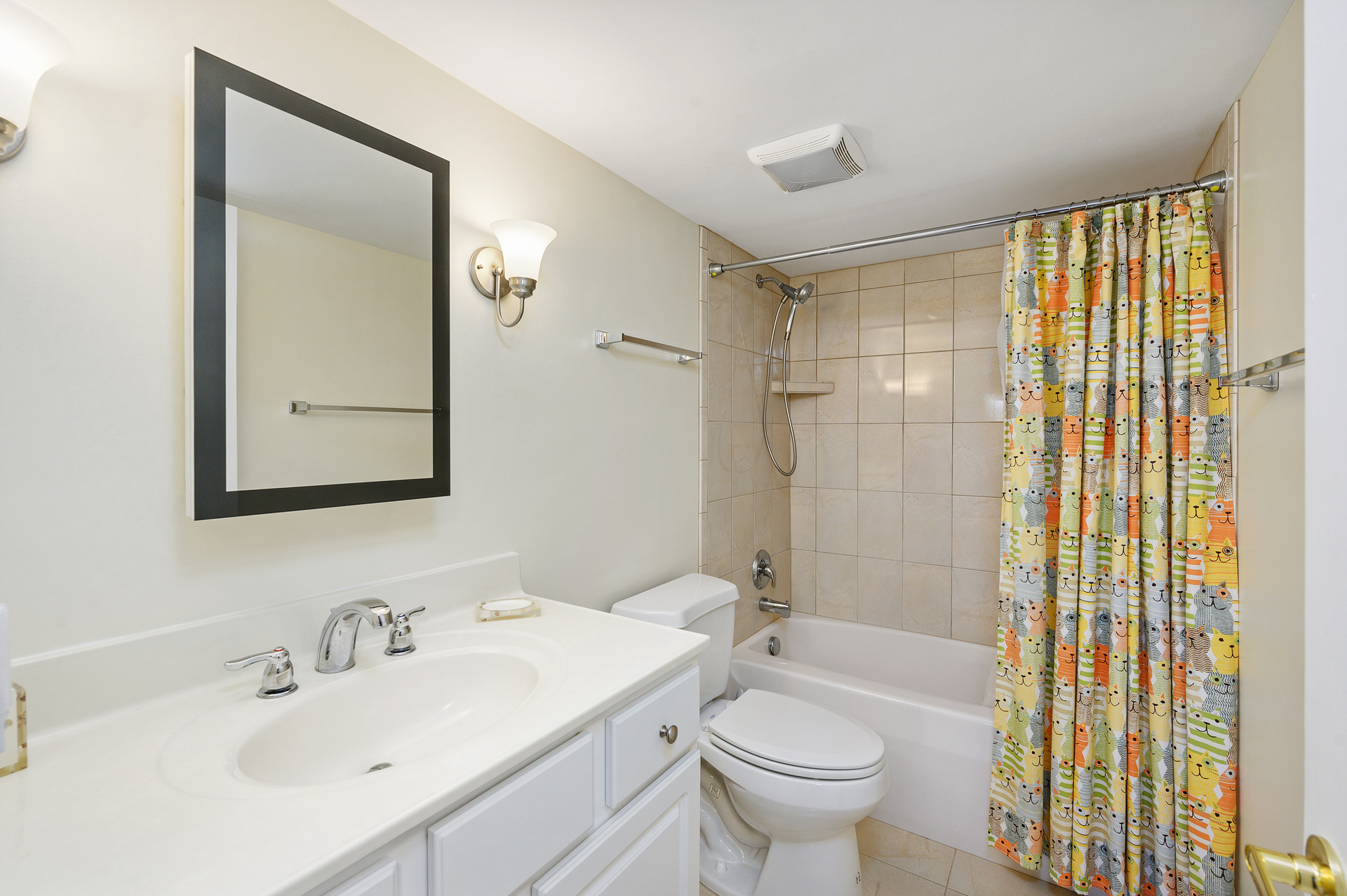 The home's 2nd bathroom has a shower/tub combo